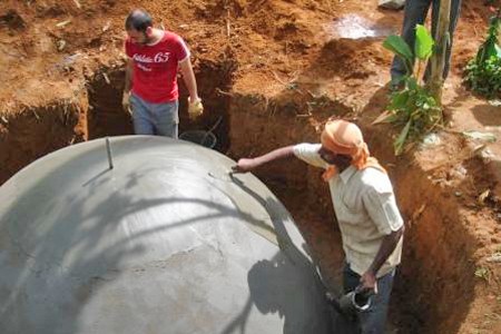 A biogas tank is installed in Tamil Nadu, India and two cows will be provided. Slurry collected will be used to generate cooking gas. (picture: Operation Raleigh)